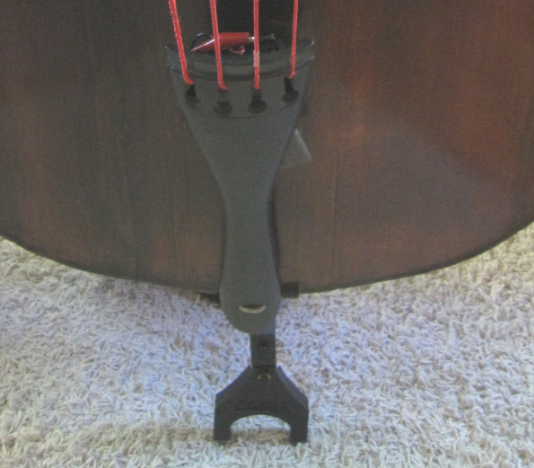 photo of rocking forked foot on upright bass